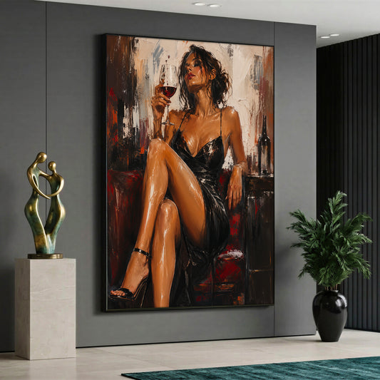 A vertical canvas wall art displaying an elegant woman in a black dress holding a glass of red wine, displayed on a grey wall in a modern setting.