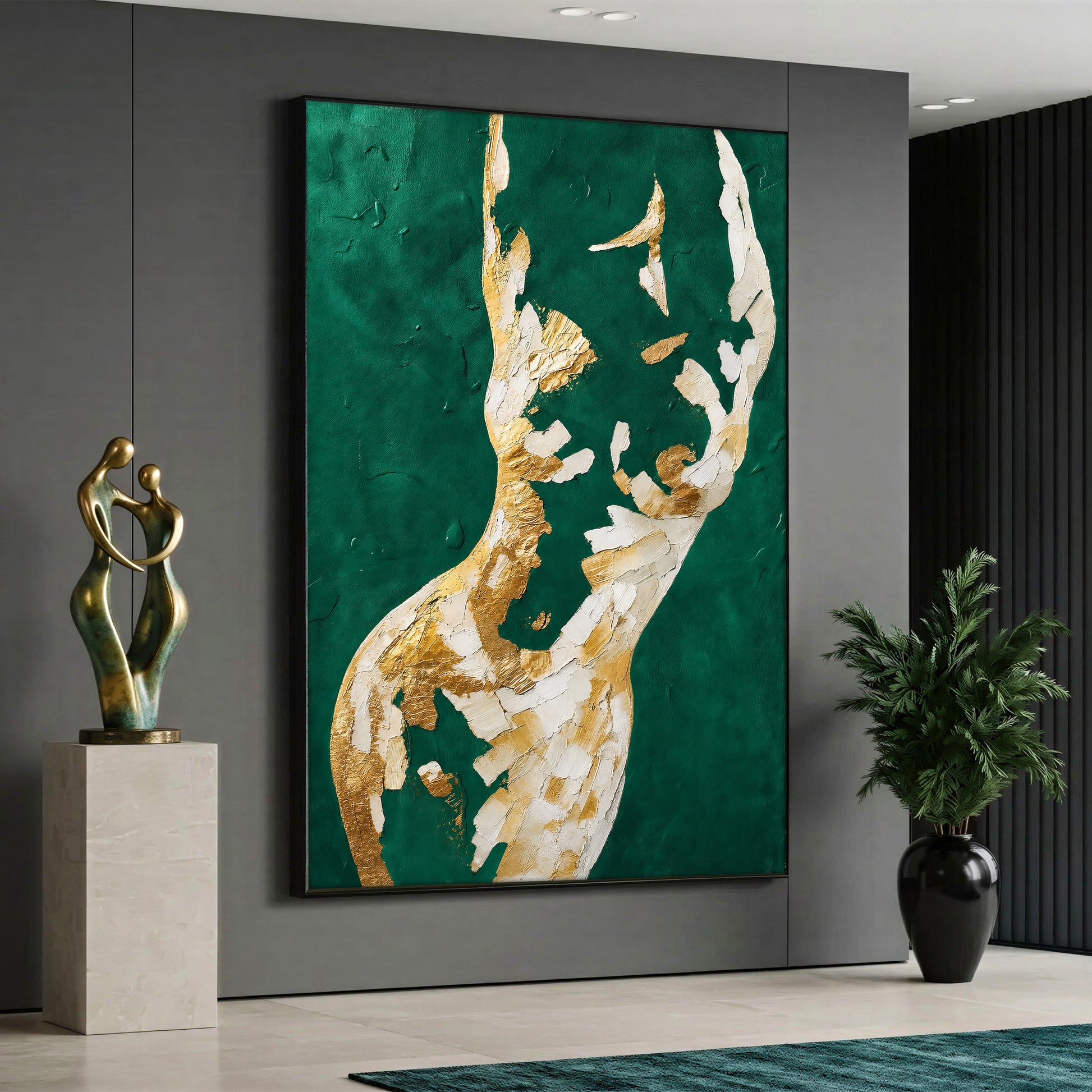 A vertical canvas art showcasing a textured abstract female silhouette in gold and white paint over an emerald green background, mounted on a grey wall.