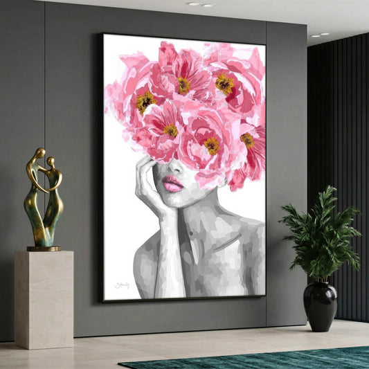 Large vertical canvas print of a black and white woman silhouette with large pink peony flowers blooming from her head, styled in a modern interior.