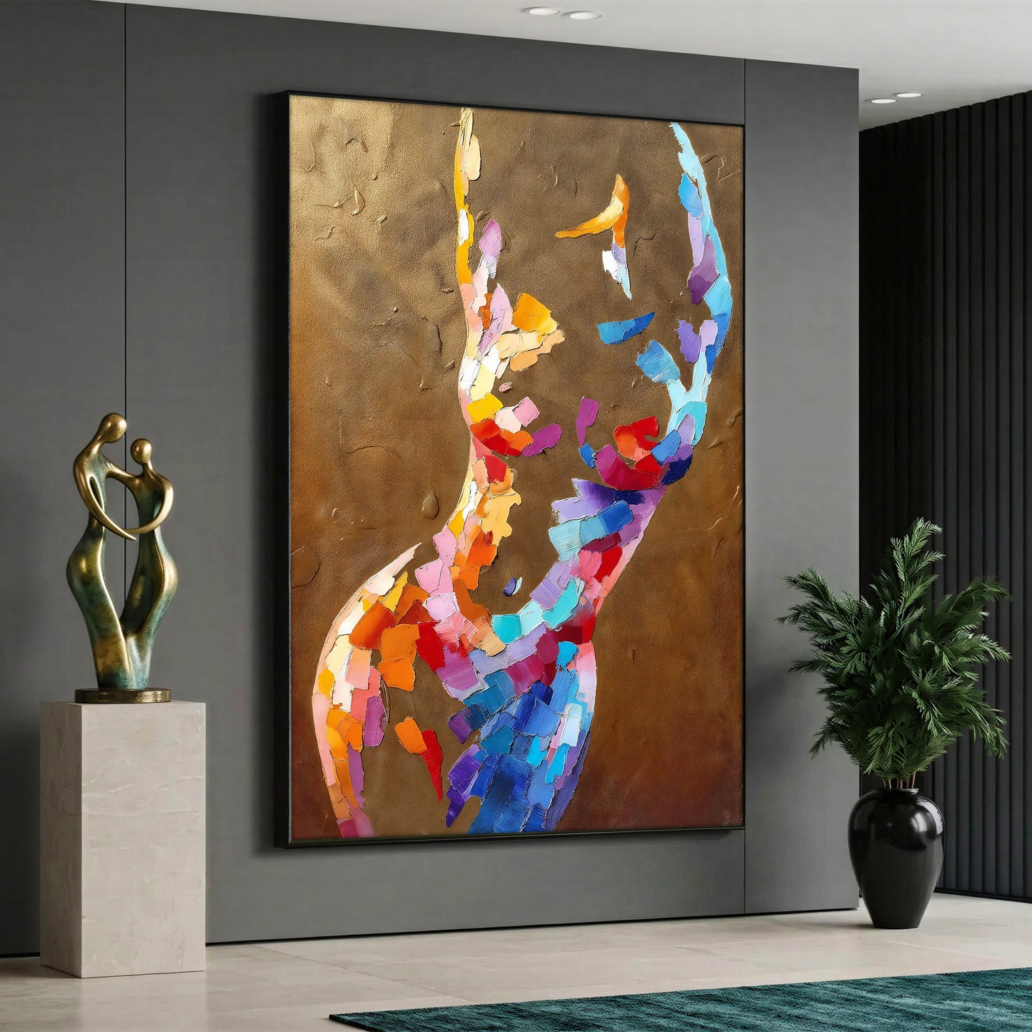 Large vertical canvas print featuring a vibrant multicolor abstract woman silhouette with thick brushstroke texture on a metallic gold-bronze background, styled in a minimalist room.