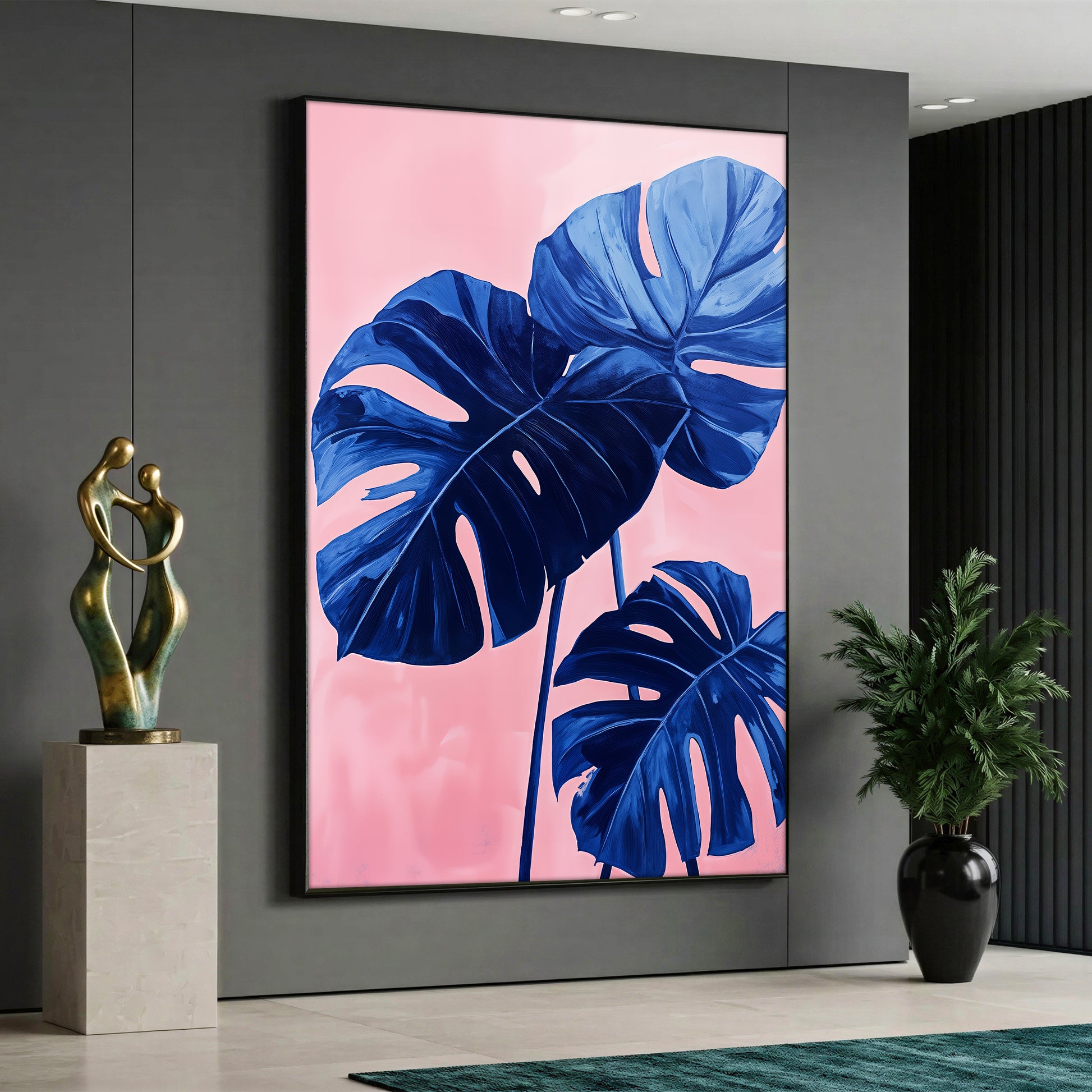 Canvas wall art showing three large blue monstera leaves illustrations on a vibrant pink background