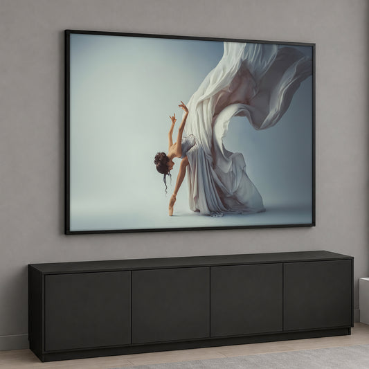 A graceful female ballerina dancing on pointes with a large, flowing dramatic white fabric behind her against a light gray background.